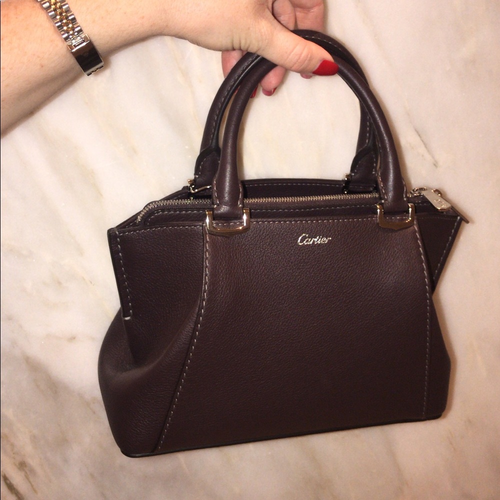 Cartier bag. Comes with body strap